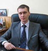 На фото Жмаев Александр Викторович